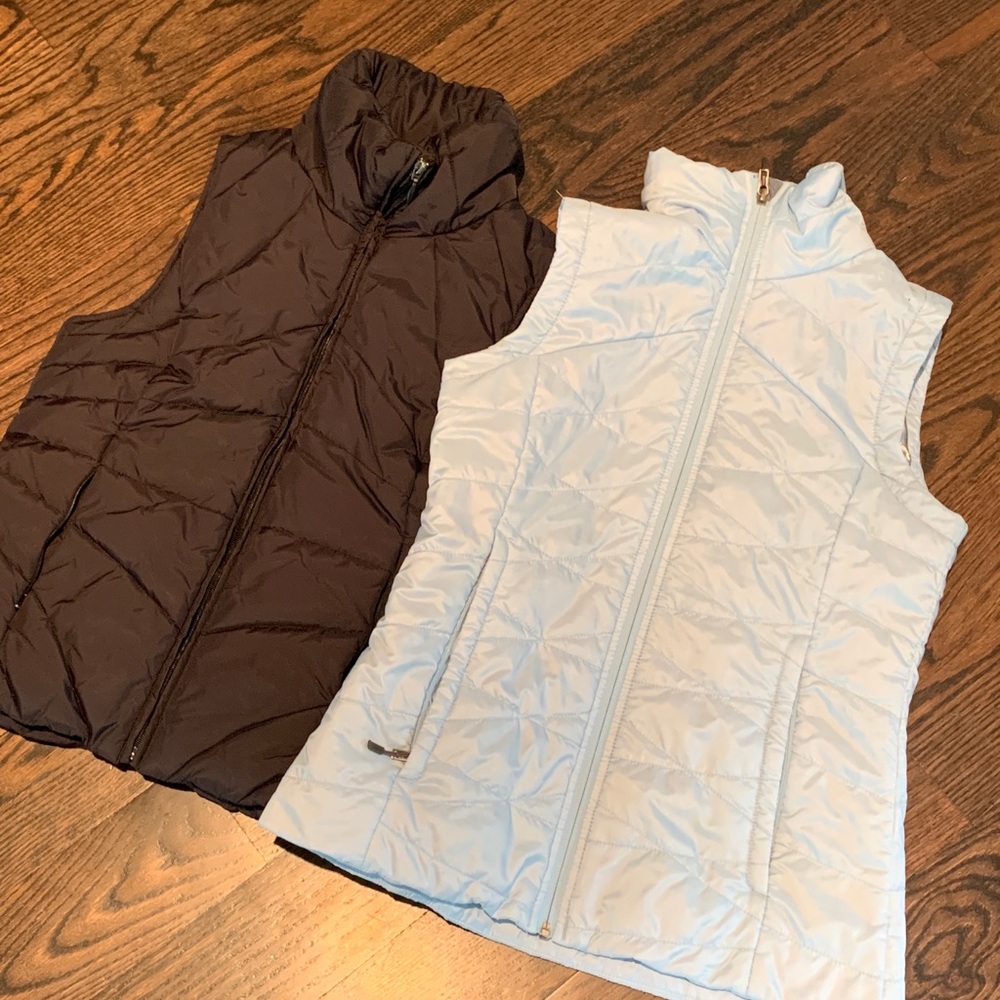 TWO (2) sleeveless puff jackets.